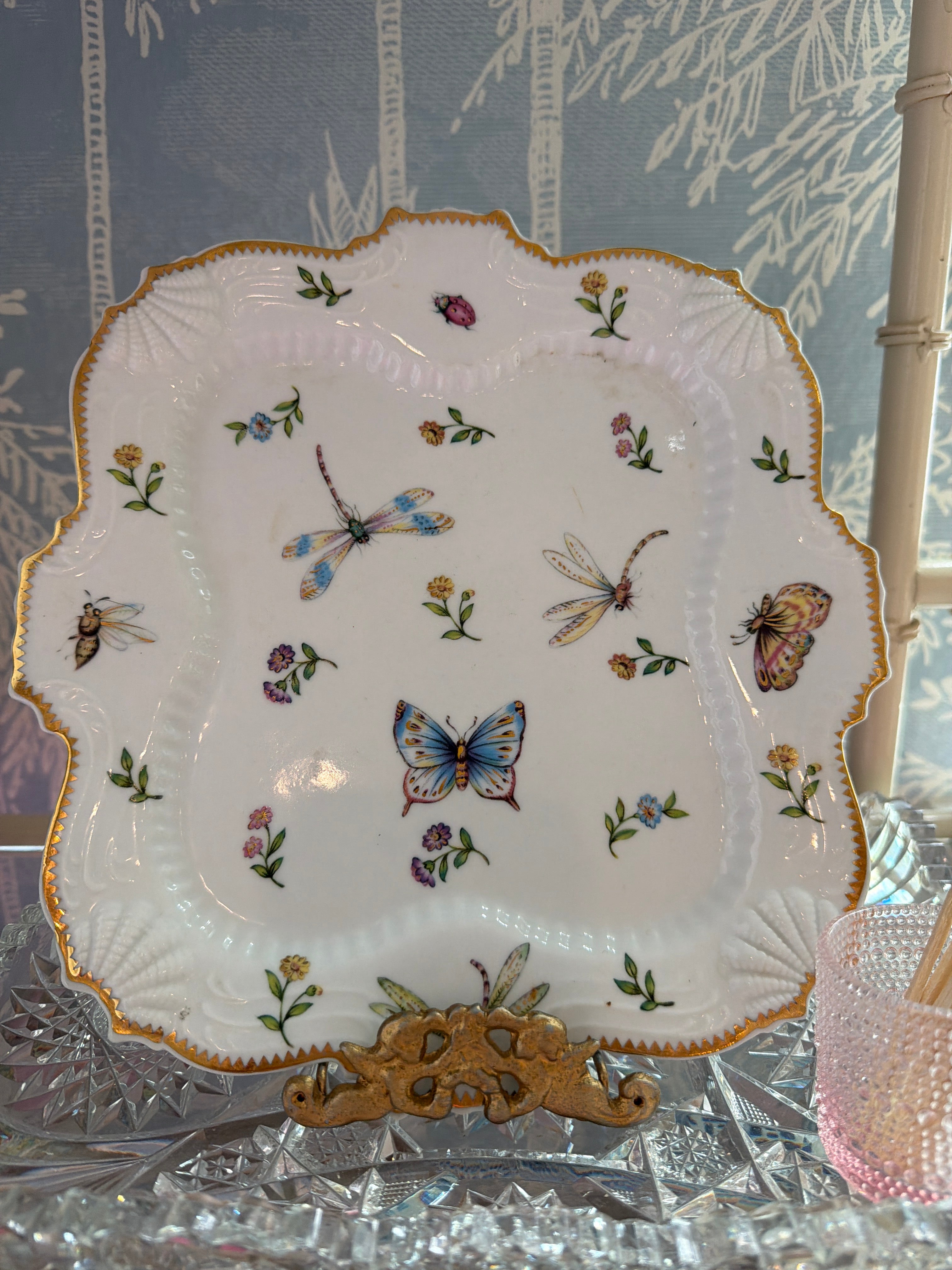 A Godinger & Co. Primavera porcelain plate with insect and floral decoration