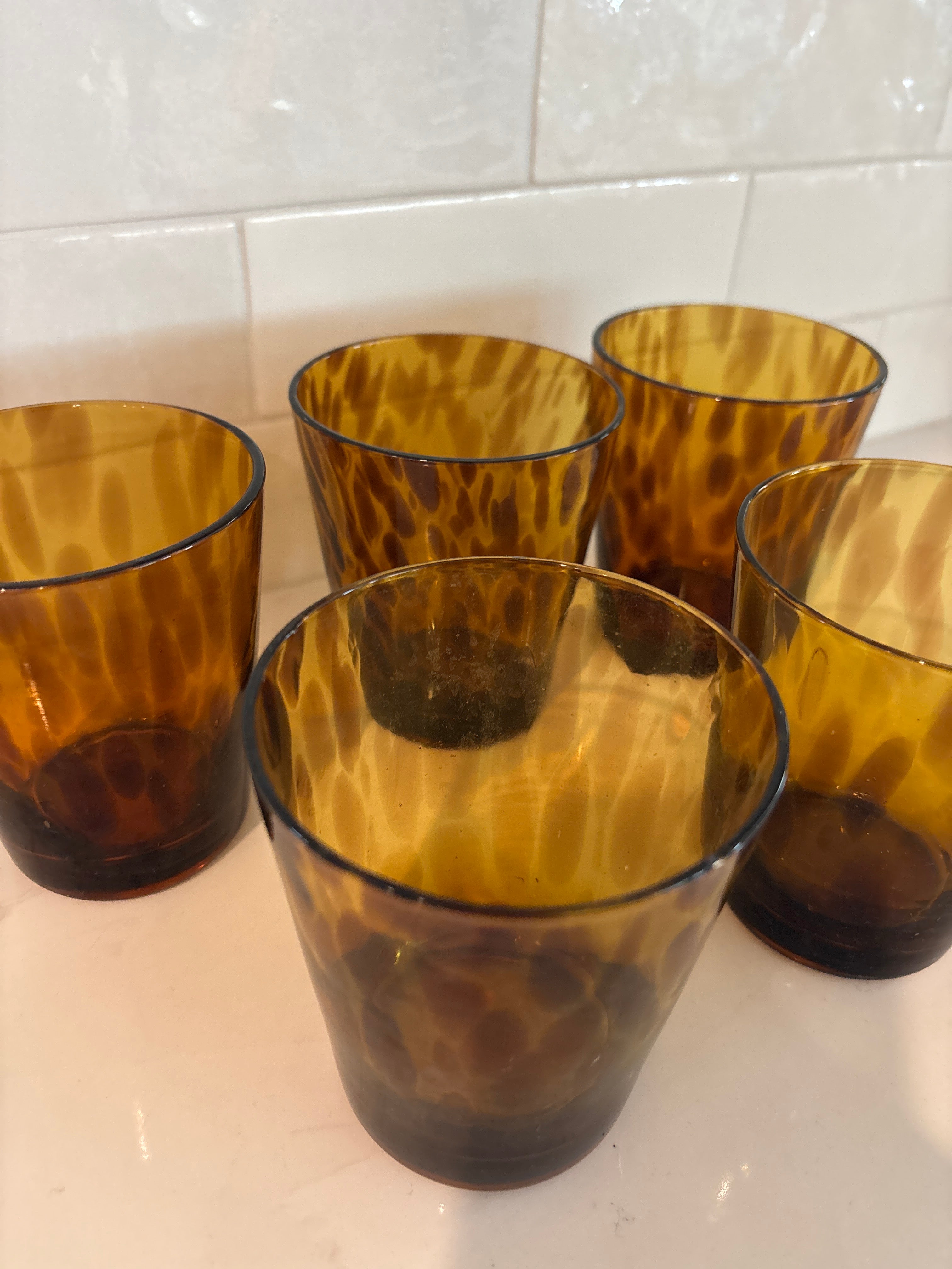 Set of five hand-blown amber tortoise shell pattern glass tumblers- low ball