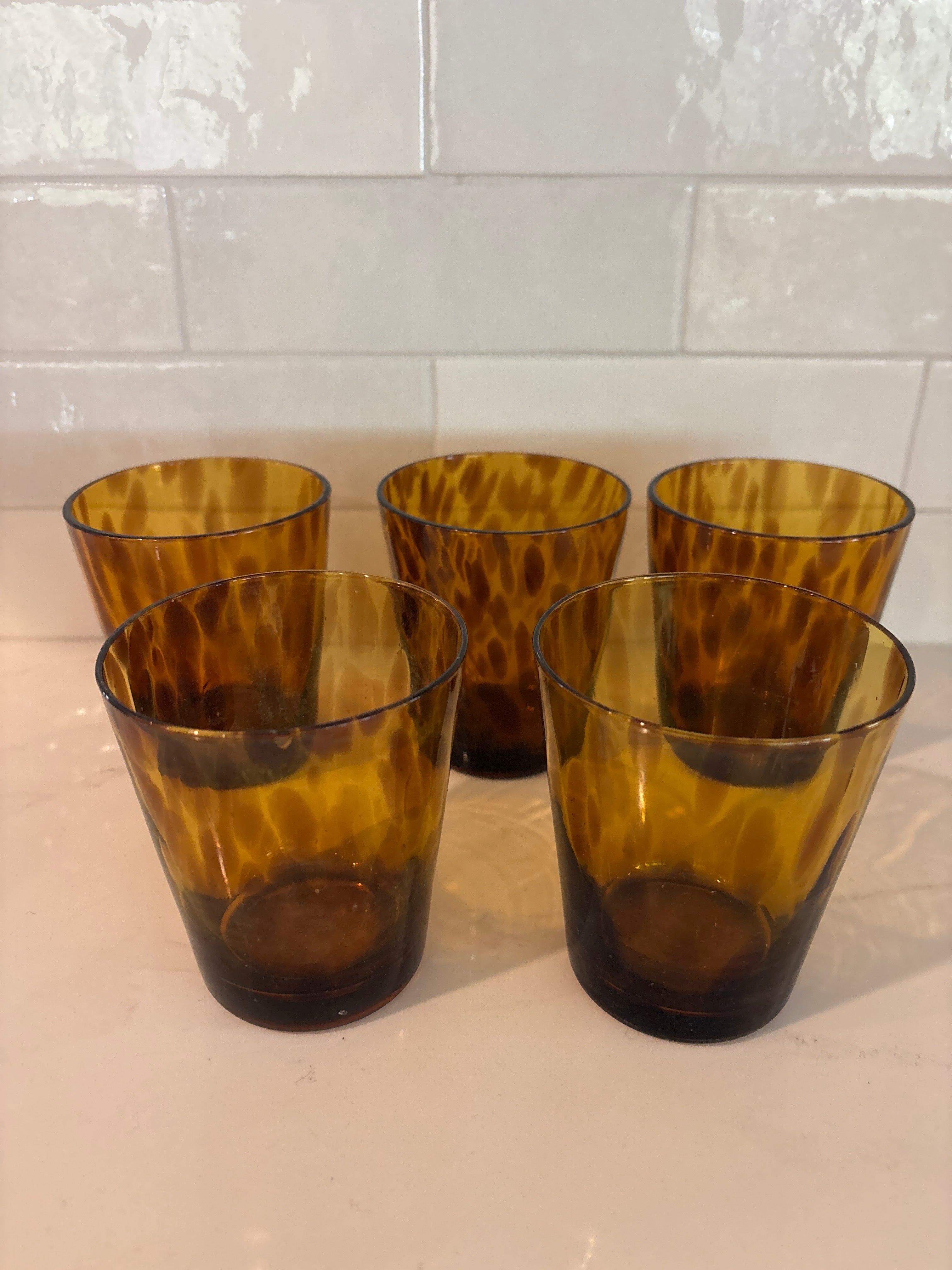 Set of five hand-blown amber tortoise shell pattern glass tumblers- low ball