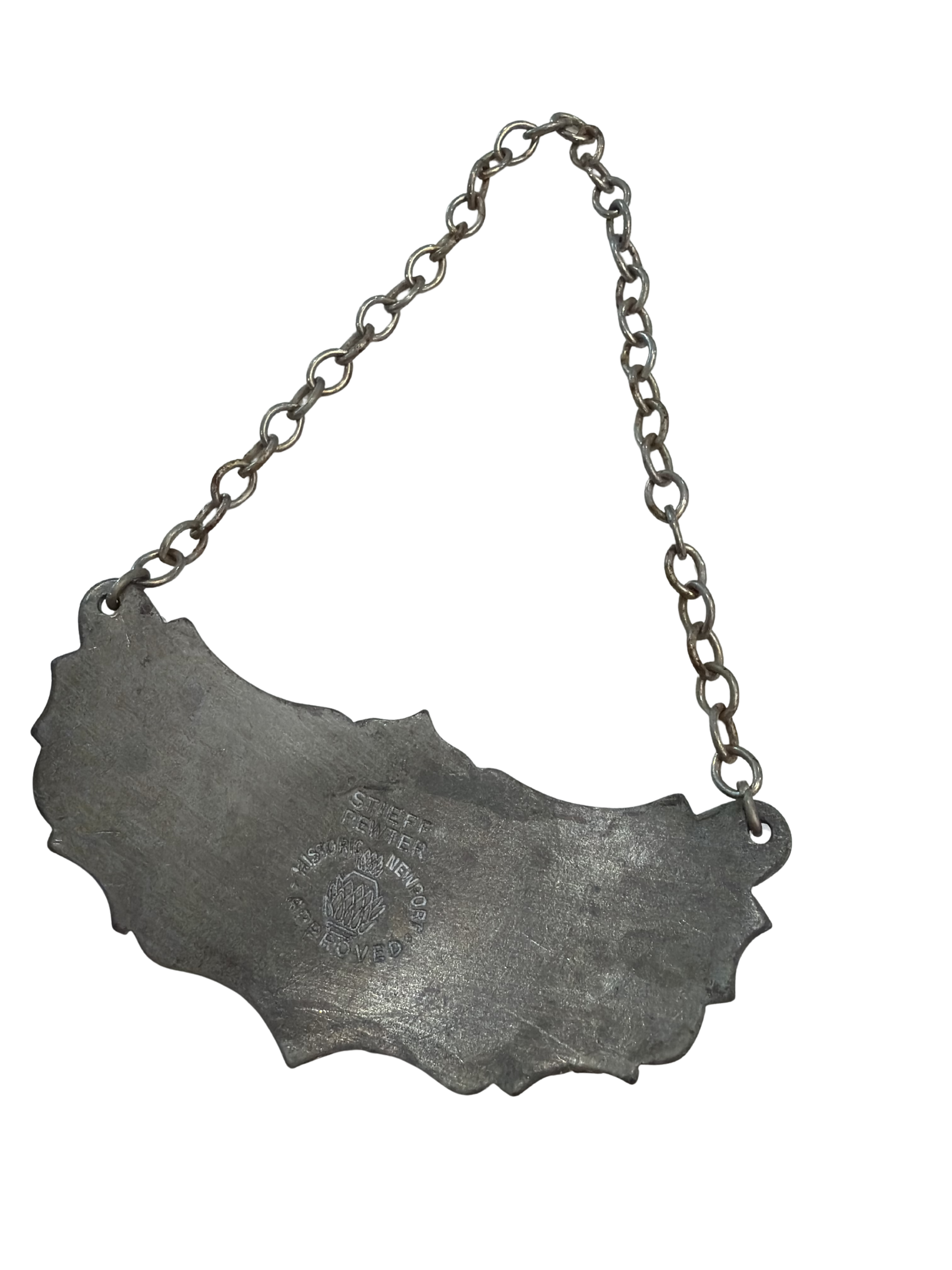 A set of three vintage metal decanter tags for Bourbon, Vodka, and Scotch
