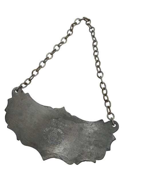 A set of three vintage metal decanter tags for Bourbon, Vodka, and Scotch