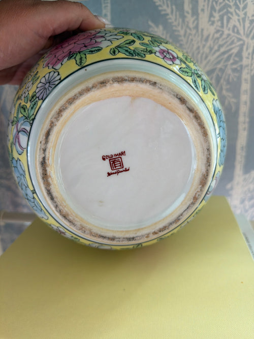 A Chinese famille rose style ceramic planter with floral motifs